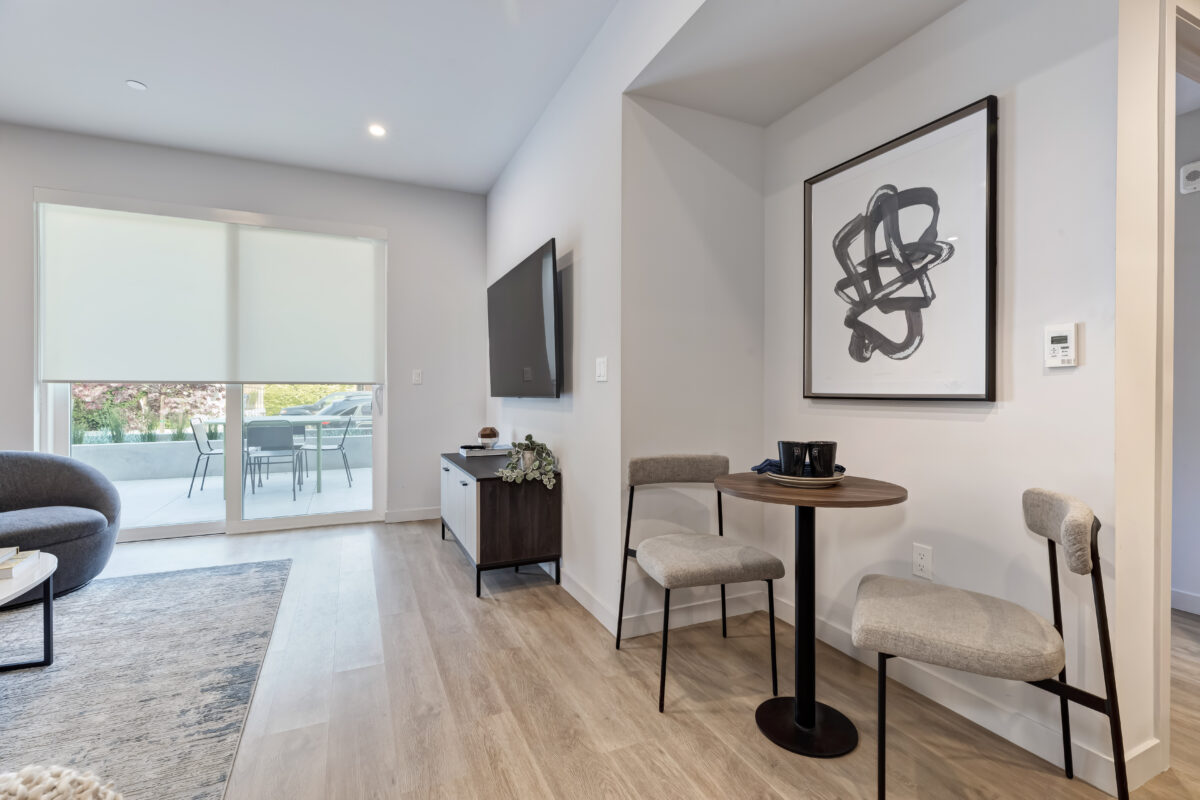 open concept living room with glass patio doors