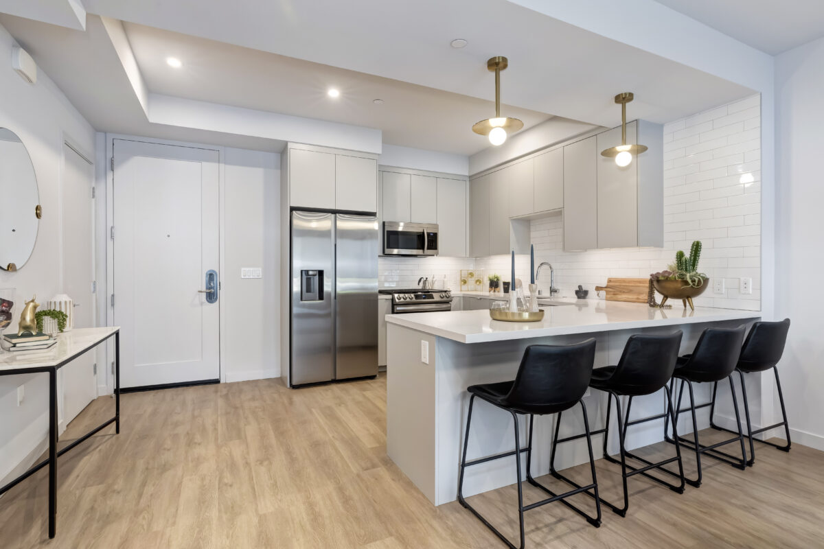 kitchen from living room with bar area