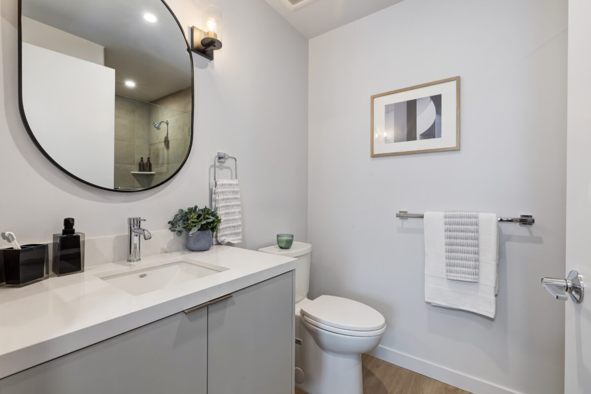 bathroom with toilet and shower stall