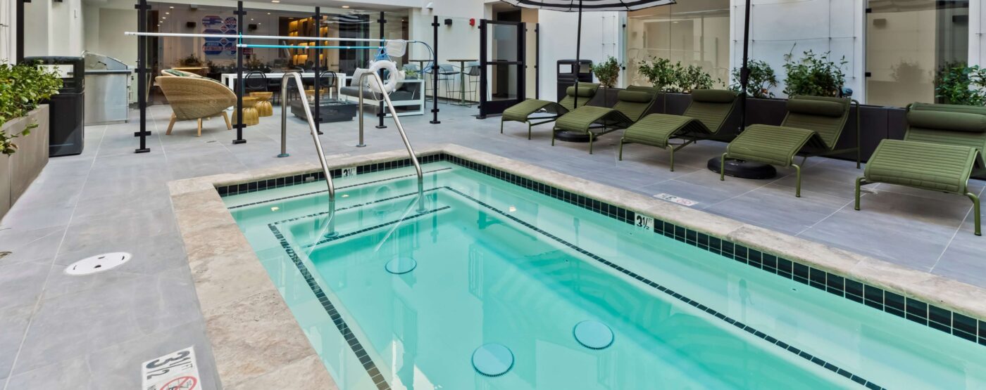 Pool with covered deck seating